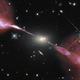 Illustration for article titled Astronomers Found the Ghost of a Rare Giant Radio Galaxy